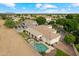 Private backyard with a pool, spa, covered patio and well manicured desert landscaping at 2625 N 24Th St # 22, Mesa, AZ 85213