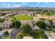 Neighborhood aerial view shows mature trees, well manicured homes, and community green space at 2625 N 24Th St # 22, Mesa, AZ 85213
