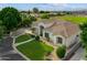 Expansive home with lush landscaping, a circular driveway, and ample parking space in a desirable neighborhood at 2625 N 24Th St # 22, Mesa, AZ 85213