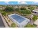 Aerial view of a full tennis and basketball court in a lush planned community at 2625 N 24Th St # 22, Mesa, AZ 85213