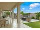 Spacious covered patio perfect for outdoor relaxation, featuring comfortable seating and views of the backyard at 2625 N 24Th St # 22, Mesa, AZ 85213
