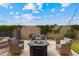 Backyard haven includes a fire pit, comfortable seating, and lush greenery for a relaxing outdoor experience at 2625 N 24Th St # 22, Mesa, AZ 85213