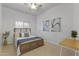 Inviting bedroom with a cozy bed, complemented by soft lighting and tasteful decor at 2625 N 24Th St # 22, Mesa, AZ 85213