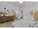 Cozy bedroom showing a view to the ensuite bath, storage, and decor at 2625 N 24Th St # 22, Mesa, AZ 85213