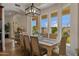 Dining room showcasing a decorative chandelier and outdoor view at 2625 N 24Th St # 22, Mesa, AZ 85213