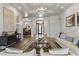 Open-concept foyer with views to the dining, living room, and decorative glass front door at 2625 N 24Th St # 22, Mesa, AZ 85213