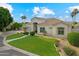 Charming single-story home features lush landscaping, a well-manicured lawn, and a welcoming entrance at 2625 N 24Th St # 22, Mesa, AZ 85213