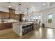 Open kitchen and dining area with granite countertops and a backyard view at 2625 N 24Th St # 22, Mesa, AZ 85213