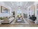 Inviting living room featuring a stylish rug, recessed lights, and double doors to the outside at 2625 N 24Th St # 22, Mesa, AZ 85213