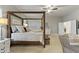 Inviting main bedroom with a four-poster bed, soft furnishings, and ample natural light at 2625 N 24Th St # 22, Mesa, AZ 85213