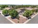 Aerial view showcasing a home with mature trees, and surrounding landscape at 2648 E Teakwood Pl, Chandler, AZ 85249