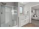 Bright bathroom featuring a glass enclosed shower, soaking tub, and neutral tones at 2648 E Teakwood Pl, Chandler, AZ 85249