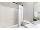 Bathroom featuring a tub and shower combo with a white shower curtain at 2648 E Teakwood Pl, Chandler, AZ 85249