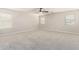 Large bedroom featuring plush neutral carpet and multiple windows allowing ample natural light at 2648 E Teakwood Pl, Chandler, AZ 85249