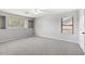 A neutral-toned bedroom with large windows that provide ample natural light at 2648 E Teakwood Pl, Chandler, AZ 85249