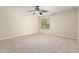 This bedroom features plush carpeting and a window providing plenty of natural light at 2648 E Teakwood Pl, Chandler, AZ 85249