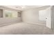 Spacious bedroom with neutral carpeting, large window, and bright natural light at 2648 E Teakwood Pl, Chandler, AZ 85249