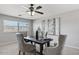 A modern dining room with stylish chairs and natural light at 2648 E Teakwood Pl, Chandler, AZ 85249