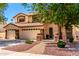 Charming two-story home with a three-car garage and welcoming curb appeal at 2648 E Teakwood Pl, Chandler, AZ 85249