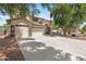 Attractive two-story home featuring a three car garage, neutral paint scheme, and a well-maintained landscape at 2648 E Teakwood Pl, Chandler, AZ 85249