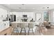 Modern kitchen featuring white cabinetry, stainless steel appliances, and a spacious island at 2648 E Teakwood Pl, Chandler, AZ 85249