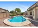Gorgeous backyard showcasing a private pool, landscaping, and serene outdoor living at 2648 E Teakwood Pl, Chandler, AZ 85249