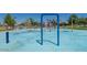 Community splash pad with fun water features for , surrounded by grassy areas at 30963 W Columbus Ave, Buckeye, AZ 85396