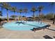 Community splash pad with water features for surrounded by mature shade trees at 30963 W Columbus Ave, Buckeye, AZ 85396