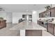 Kitchen showcasing granite countertops, stainless steel appliances and an expansive center island at 36085 W Prado St, Maricopa, AZ 85138