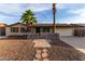 Inviting single-Gathering home with desert landscaping and stone pathway to front door at 3643 E Friess Dr, Phoenix, AZ 85032