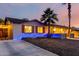 Charming single-story home with desert landscaping, driveway and mature palm tree at 3643 E Friess Dr, Phoenix, AZ 85032