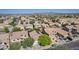Expansive aerial view of a community with desert landscaping and mountain backdrop at 3823 S 101St Dr, Tolleson, AZ 85353