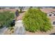 An aerial view of a beautiful single-Gathering home with a well-maintained roof and landscaping at 3823 S 101St Dr, Tolleson, AZ 85353