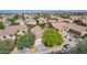 Aerial view of a cozy home nestled in a well-planned community with lush greenery at 3823 S 101St Dr, Tolleson, AZ 85353