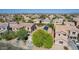Home with a tile roof in a residential neighborhood, captured from an aerial perspective at 3823 S 101St Dr, Tolleson, AZ 85353