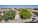 Suburban home showcasing beautiful landscaping, a tile roof, and neat surroundings at 3823 S 101St Dr, Tolleson, AZ 85353