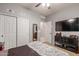 Serene bedroom featuring closet space, soft lighting, and a calming color scheme at 3823 S 101St Dr, Tolleson, AZ 85353