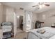 Inviting main bedroom with a cozy bed setup and ensuite bathroom entrance at 3823 S 101St Dr, Tolleson, AZ 85353