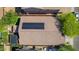 Aerial view of a roof with solar panels and a landscaped backyard at 3823 S 101St Dr, Tolleson, AZ 85353