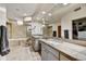 Bathroom featuring a dual sink vanity, soaking tub and glass enclosed shower at 39032 N 101St Way, Scottsdale, AZ 85262