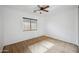 Simple bedroom with carpet floors and natural light from the window at 4587 E Silverbell Rd, San Tan Valley, AZ 85143