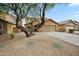 Charming single-Gathering home featuring a well-maintained yard, desert landscape, and a two-car garage at 4587 E Silverbell Rd, San Tan Valley, AZ 85143