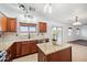 Charming kitchen features granite countertops, tile backsplash, and stainless steel appliances at 4587 E Silverbell Rd, San Tan Valley, AZ 85143