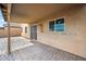 Covered patio with tiled pavers, ideal for outdoor entertaining and relaxation at 4587 E Silverbell Rd, San Tan Valley, AZ 85143