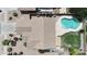 Aerial view showcasing a backyard oasis with pool, patio, and well-maintained landscaping at 5220 W Desert Ln, Laveen, AZ 85339