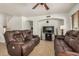 Spacious living room with tile floors and comfortable seating for gathering and relaxing at 5220 W Desert Ln, Laveen, AZ 85339
