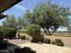 View of desert landscaping, pavers and view fence in the backyard at 5420 S Mariposa Dr, Gilbert, AZ 85298