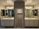 Primary bathroom includes dual sinks, attractive lighting and a separate commode at 5420 S Mariposa Dr, Gilbert, AZ 85298