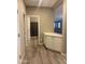 Bright entryway with built in cabinets, tile flooring, and neutral colored walls at 5420 S Mariposa Dr, Gilbert, AZ 85298