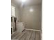 Laundry room with bright overhead light, upper and lower cabinets, utility hookups, and tile floors at 5420 S Mariposa Dr, Gilbert, AZ 85298